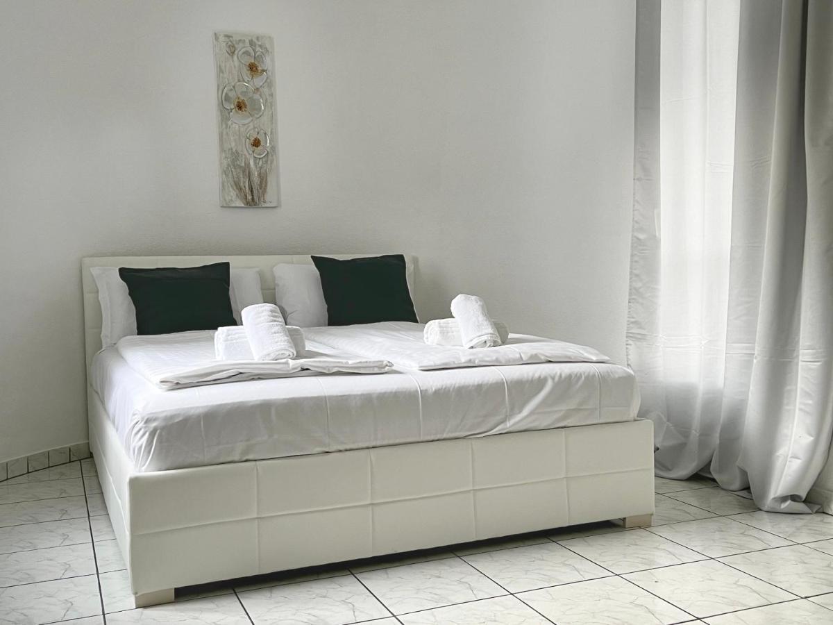 Guesthouse Lugano Apartments By Lr ภายนอก รูปภาพ